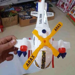 خرید اسباب بازی هلیکوپتر سفید چرخان به قیمت بسیار مناسب