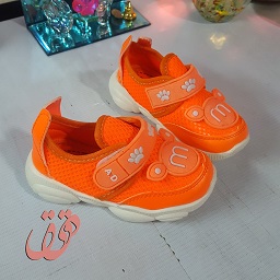 خرید کفش اسپرت پسرانه دخترانه و کودک - طرح مک کویین رنگ نارنجی سایز 22 - 23 - 24