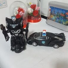 خرید اسباب بازی ماشین پلیس تبدیل شونده ربات شو - به قیمت بسیار مناسب - رنگ سیاه
